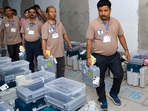 Polling officials transport EVMs to a counting centre from a strong room on the day of counting of votes for Lok Sabha elections Tuesday, June 4, 2024. (PTI Photo)(PTI06_04_2024_000070A)(PTI) Polling officials transport EVMs to a counting centre from a strong room on the day of counting of votes for Lok Sabha elections Tuesday, June 4, 2024. (PTI Photo)(PTI06_04_2024_000070A)(PTI)