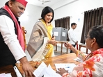 SP president Akhilesh Yadav and the party’s Mainpuri candidate Dimple Yadav voting at the polling centre in Saifai on Tuesday. (HT FILE PHOTO) SP president Akhilesh Yadav and the party’s Mainpuri candidate Dimple Yadav voting at the polling centre in Saifai on Tuesday. (HT FILE PHOTO)