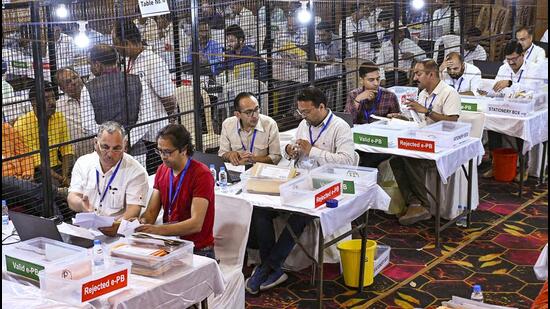 Poll officials at a counting centre in Shimla on Tuesday. (PTI)