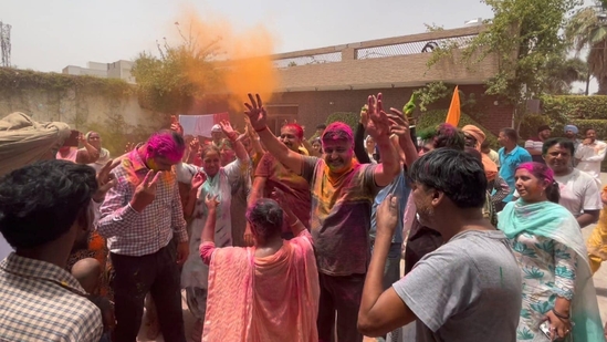 Shiromani Akali Dal workers celebrating after Harsimrat Kaur Badal's victory at Punjab's Bathinda on Tuesday.(Sanjeev/HT Photo)