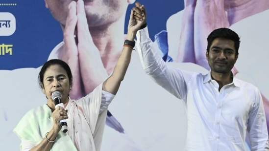 TMC Chairperson Mamata Banerjee, along with MP Abhishek Banerjee, interacts with media after winning maximum seats in her Kalighat residence in Kolkata on Tuesday. Of 42 parliamentary seats in West Bengal, ECI data showed that TMC won 29 seats while BJP won 12 and Congress won 1 seat.(Samir Jana/HT Photo)