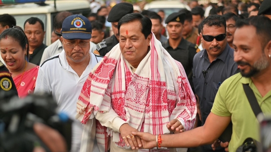 Union minister and former Assam chief minister Sarbananda Sonowal being greeted by supporters after his win from the Dibrugarh seat on Tuesday.(HT Photo)