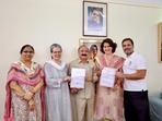 Kishori Lal Sharma with the Gandhi family in Delhi. Kishori Lal Sharma with the Gandhi family in Delhi.