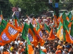 BJP supporters during a campaign rally. (ANI Photo)(HT_PRINT) BJP supporters during a campaign rally. (ANI Photo)(HT_PRINT)