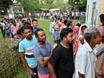 People stand in a queue to cast their votes as voting starts in the first phase of India's general election at a polling station at Nagaon district, in the country's northeastern state of Assam on April 19, 2024. (Photo by Biju BORO / AFP)(AFP) People stand in a queue to cast their votes as voting starts in the first phase of India's general election at a polling station at Nagaon district, in the country's northeastern state of Assam on April 19, 2024. (Photo by Biju BORO / AFP)(AFP)