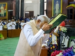 Prime Minister Narendra Modi pays respects to the Constitution of India as he attends the NDA Parliamentary Party meeting at Samvidhan Sadan, in New Delhi, Friday(PTI) Prime Minister Narendra Modi pays respects to the Constitution of India as he attends the NDA Parliamentary Party meeting at Samvidhan Sadan, in New Delhi, Friday(PTI)