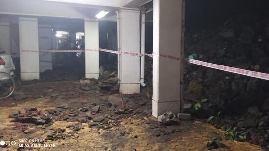 The buildings are situated 10 feet from the Nirman Viva Society and built close to the edge of the Ambegaon Pathar hill ridge. (HT PHOTO) The buildings are situated 10 feet from the Nirman Viva Society and built close to the edge of the Ambegaon Pathar hill ridge. (HT PHOTO)