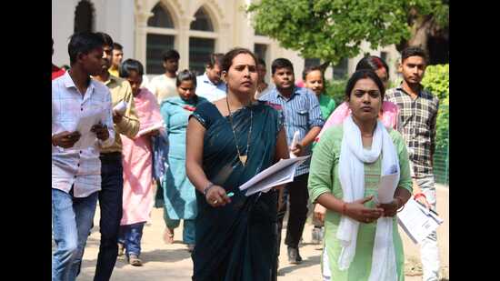 Candidates leaving the exam centre after taking the exam (HT File Photo) Candidates leaving the exam centre after taking the exam (HT File Photo)