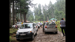 On Saturday, tourists had to wait for hours in queued vehicles to enter McLeodganj in Dharamshala due to a significant increase in the number of visitors over the past few days. (HT Photo) On Saturday, tourists had to wait for hours in queued vehicles to enter McLeodganj in Dharamshala due to a significant increase in the number of visitors over the past few days. (HT Photo)