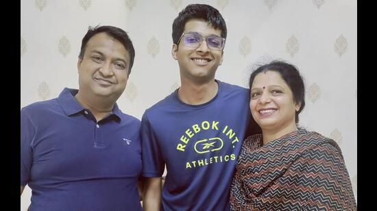 Mayank Jain with his family. He also aspires to join IIT Bombay to study computer science engineering. (HT Photo) Mayank Jain with his family. He also aspires to join IIT Bombay to study computer science engineering. (HT Photo)