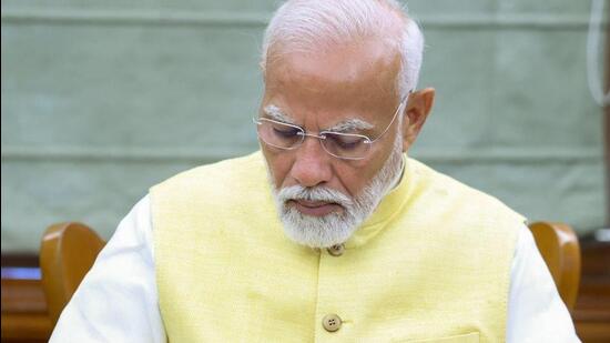 Modi signed his first file authorising release of the 17th instalment of PM Kisan Nidhi for 93 million eligible farmers. (ANI photo) Modi signed his first file authorising release of the 17th instalment of PM Kisan Nidhi for 93 million eligible farmers. (ANI photo)
