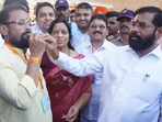 CM Eknath Shinde feeds sweets to Sena's Naresh Mhaske(Praful Gangurde/Hindustan Times) CM Eknath Shinde feeds sweets to Sena's Naresh Mhaske(Praful Gangurde/Hindustan Times)