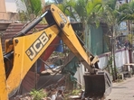 The houses of the11 accused were demolished as they were on government land(HT File) The houses of the11 accused were demolished as they were on government land(HT File)