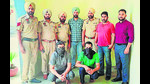 The accused who opened fire at a jewellery showroom in Doraha in custody of Ludhiana police on Saturday. (HT Photo) The accused who opened fire at a jewellery showroom in Doraha in custody of Ludhiana police on Saturday. (HT Photo)