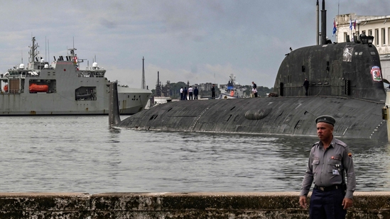Russian Marines standing on top of the Russian nuclear-powered submarine Kazan (R), part of the Russian naval detachment visiting Cuba. (Photo by YAMIL LAGE / AFP)(AFP) Russian Marines standing on top of the Russian nuclear-powered submarine Kazan (R), part of the Russian naval detachment visiting Cuba. (Photo by YAMIL LAGE / AFP)(AFP)