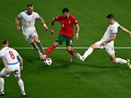 Portugal's midfielder #08 Bruno Fernandes (C) controls the ball between Czech Republic's defender #05 Vladimir Coufal (L) and Czech Republic's defender #04 Robin Hranac (R)(AFP) Portugal's midfielder #08 Bruno Fernandes (C) controls the ball between Czech Republic's defender #05 Vladimir Coufal (L) and Czech Republic's defender #04 Robin Hranac (R)(AFP)