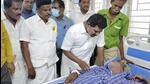 Officials interact with a patient who is undergoing treatment after consuming spurious liquor in Kallakurichi, Tamil Nadu. (PTI Photo) Officials interact with a patient who is undergoing treatment after consuming spurious liquor in Kallakurichi, Tamil Nadu. (PTI Photo)