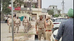 Police at the crime scene in Mullanpur, Mohali, on Friday. (HT Photo) Police at the crime scene in Mullanpur, Mohali, on Friday. (HT Photo)