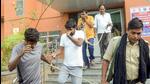 Economic Offences Unit officials leave with the accused arrested in the NEET paper leak case, in Patna, on Sunday. (PTI) Economic Offences Unit officials leave with the accused arrested in the NEET paper leak case, in Patna, on Sunday. (PTI)