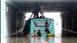 A bus stuck in the Azad Market underpass near Rani Jhansi Flyover in north Delhi on Friday. (ANI) A bus stuck in the Azad Market underpass near Rani Jhansi Flyover in north Delhi on Friday. (ANI)