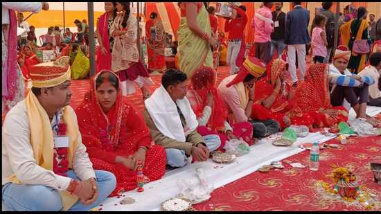 Mass marriage ceremony taking place in Prayagraj (HT FILE PHOTO) Mass marriage ceremony taking place in Prayagraj (HT FILE PHOTO)