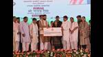 Haryana chief minister Nayab Singh Saini with one of the beneficiaries during a state-level function in Panipat on Sunday. (HT) Haryana chief minister Nayab Singh Saini with one of the beneficiaries during a state-level function in Panipat on Sunday. (HT)