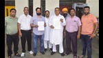 Activists on Monday with a copy of the memorandum before submitting to the district administration, highlighting the shortage of resources at civil hospital in Ludhiana. (Gurpreet Singh/HT) Activists on Monday with a copy of the memorandum before submitting to the district administration, highlighting the shortage of resources at civil hospital in Ludhiana. (Gurpreet Singh/HT)