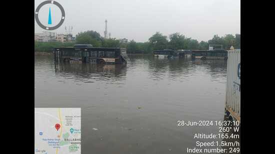 Such was the condition of the infrastructure that eight of the buses were submerged in water there after heavy rainfall on June 28. Six buses were pulled out with cranes and made functional after repairs but engines of the other two were still not working, officials said. (HT PHOTO) Such was the condition of the infrastructure that eight of the buses were submerged in water there after heavy rainfall on June 28. Six buses were pulled out with cranes and made functional after repairs but engines of the other two were still not working, officials said. (HT PHOTO)