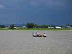 People wade through flood waters on a boat at Lehpati village of Morigaon district in India's northeastern state of Assam on July 3, 2024. (Photo by Biju BORO / AFP)(AFP) People wade through flood waters on a boat at Lehpati village of Morigaon district in India's northeastern state of Assam on July 3, 2024. (Photo by Biju BORO / AFP)(AFP)