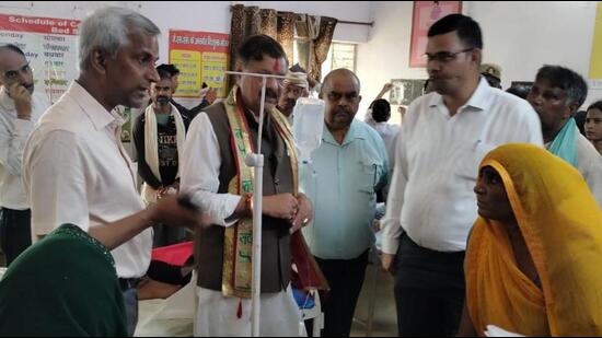 Officials overseeing the well-being of patients at a hospital. (HT)