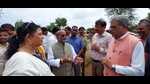 UP minister Arun Kumar Saxena visiting the affected areas. (HT) UP minister Arun Kumar Saxena visiting the affected areas. (HT)