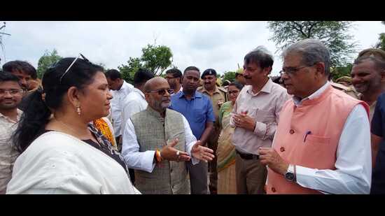 UP minister Arun Kumar Saxena visiting the affected areas. (HT) UP minister Arun Kumar Saxena visiting the affected areas. (HT)