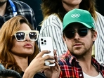 US actress Eva Mendes (L) and her partner Canadian actor Ryan Gosling (R) attend the artistic gymnastics women's uneven bars final during the Paris 2024 Olympic Games at the Bercy Arena in Paris, on August 4, 2024. (AFP) US actress Eva Mendes (L) and her partner Canadian actor Ryan Gosling (R) attend the artistic gymnastics women's uneven bars final during the Paris 2024 Olympic Games at the Bercy Arena in Paris, on August 4, 2024. (AFP)