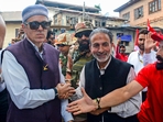 Jammu and Kashmir National Conference vice president Omar Abdullah being greeted by supporters upon his arrival to file nomination from Ganderbal. (PTI) Jammu and Kashmir National Conference vice president Omar Abdullah being greeted by supporters upon his arrival to file nomination from Ganderbal. (PTI)