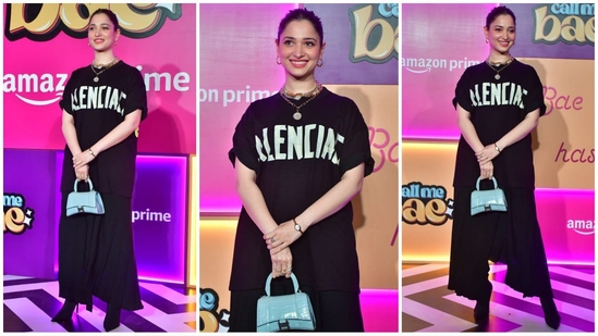 Tamannaah Bhatia nailed the cool-girl vibe in a Balenciaga top paired with stylish flared pants. She completed the trendy look with layered gold necklaces, hoop earrings, a mini blue bag, and heels, exuding effortless style.(HT Photo/VarinderChawla)