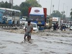 Vehicles and commuters are struggling to navigate through knee-deep water on NH-48 near Narsinghpur Village in Gurugram.(Parveen Kumar/HT Photo) Vehicles and commuters are struggling to navigate through knee-deep water on NH-48 near Narsinghpur Village in Gurugram.(Parveen Kumar/HT Photo)
