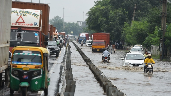 Heavy traffic disruptions have been reported in Gurugram following the heavy rain. IMD forecasts light to moderate showers across Delhi-NCR until September 14.(Parveen Kumar/HT Photo)