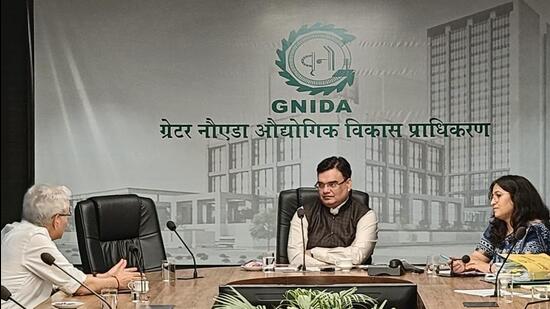GNIDA ACEO Saumya Srivastava and other officials at the recent meeting for deciding on the flat registry directives. (HT Photo) GNIDA ACEO Saumya Srivastava and other officials at the recent meeting for deciding on the flat registry directives. (HT Photo)