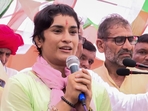 Jind: Congress candidate from Julana seat Vinesh Phogat speaks during a programme, ahead of Haryana Assembly elections, at Bakta Khera village in Jind district, Sunday, Sept. 8, 2024. (PTI Photo) (PTI) Jind: Congress candidate from Julana seat Vinesh Phogat speaks during a programme, ahead of Haryana Assembly elections, at Bakta Khera village in Jind district, Sunday, Sept. 8, 2024. (PTI Photo) (PTI)