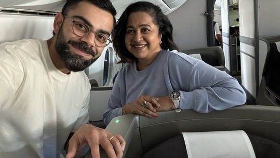 Virat Kohli indulged Radhika Sarathkumar for a selfie. Virat Kohli indulged Radhika Sarathkumar for a selfie.