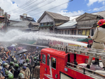 Shimla: Police use water cannon to disperse protestors, who had gathered on the call of Hindu groups, demanding the demolition of an illegal structure in a mosque, at Sanjauli locality in Shimla, Wednesday, Sept 11, 2024. (PTI Photo) (PTI09_11_2024_000246B)(PTI) Shimla: Police use water cannon to disperse protestors, who had gathered on the call of Hindu groups, demanding the demolition of an illegal structure in a mosque, at Sanjauli locality in Shimla, Wednesday, Sept 11, 2024. (PTI Photo) (PTI09_11_2024_000246B)(PTI)