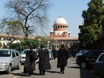 Lawyers outside the Supreme Court.(PTI Photo) Lawyers outside the Supreme Court.(PTI Photo)