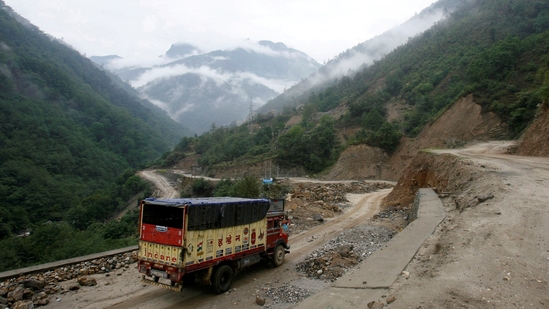 FILE PHOTO: A liquefied petroleum gas (LPG) delivery truck drives along India's Tezpur-Tawang highway which runs to the Chinese border, in the northeastern Indian state of Arunachal Pradesh May 29, 2012./File Photo(REUTERS)
