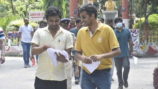 Civil Service aspirants are seen discussing after appearing for the UPSC Civil Services Main Examination 2024 at the College of Commerce in Patna.(Santosh Kumar)