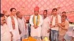 Mukesh Sharma (centre) at a rally on Monday. (HT Photo) Mukesh Sharma (centre) at a rally on Monday. (HT Photo)