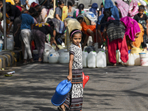 New Delhi: A child waits to collect water from a municipality tanker, at Chanakyapuri area in New Delhi, Thursday, June, 6, 2024. (PTI Photo/Kamal Singh)(PTI) New Delhi: A child waits to collect water from a municipality tanker, at Chanakyapuri area in New Delhi, Thursday, June, 6, 2024. (PTI Photo/Kamal Singh)(PTI)