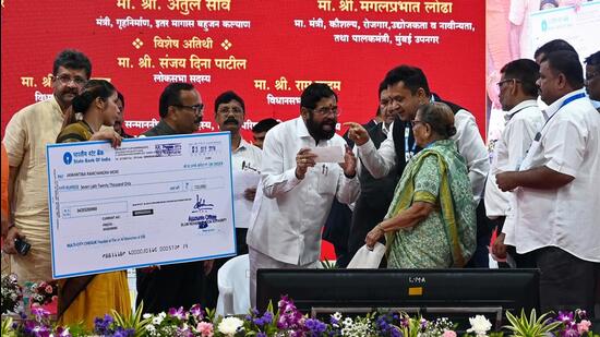 On September 3, CM Eknath Shinde distributed cheques to beneficiaries of the Ramabai Nagar and Kamraj Nagar redevelopment projects in Ghatkopar. The projects are being undertaken jointly by MMRDA and SRA. (Raju Shinde/HT Photo) On September 3, CM Eknath Shinde distributed cheques to beneficiaries of the Ramabai Nagar and Kamraj Nagar redevelopment projects in Ghatkopar. The projects are being undertaken jointly by MMRDA and SRA. (Raju Shinde/HT Photo)