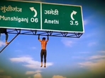 The 16-second clip also shows his trying to pull himself up by his legs to sit on the signboard.(X/AmethiLive) The 16-second clip also shows his trying to pull himself up by his legs to sit on the signboard.(X/AmethiLive)