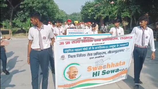 Following the opening ceremony, a procession was organised from the court premises and culminating at the Collectorate compound. The march saw enthusiastic participation from judicial officers, advocates, court staff, and paralegal volunteers. (HT Photo) Following the opening ceremony, a procession was organised from the court premises and culminating at the Collectorate compound. The march saw enthusiastic participation from judicial officers, advocates, court staff, and paralegal volunteers. (HT Photo)