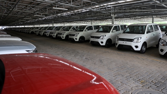 Cars are seen parked under solar panels at the manufacturing plant of Maruti Suzuki in Manesar, in the northern state of Haryana, India, September 26, 2023.(Anushree Fadnavis/Reuters)